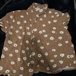 A floral button down t-shirt